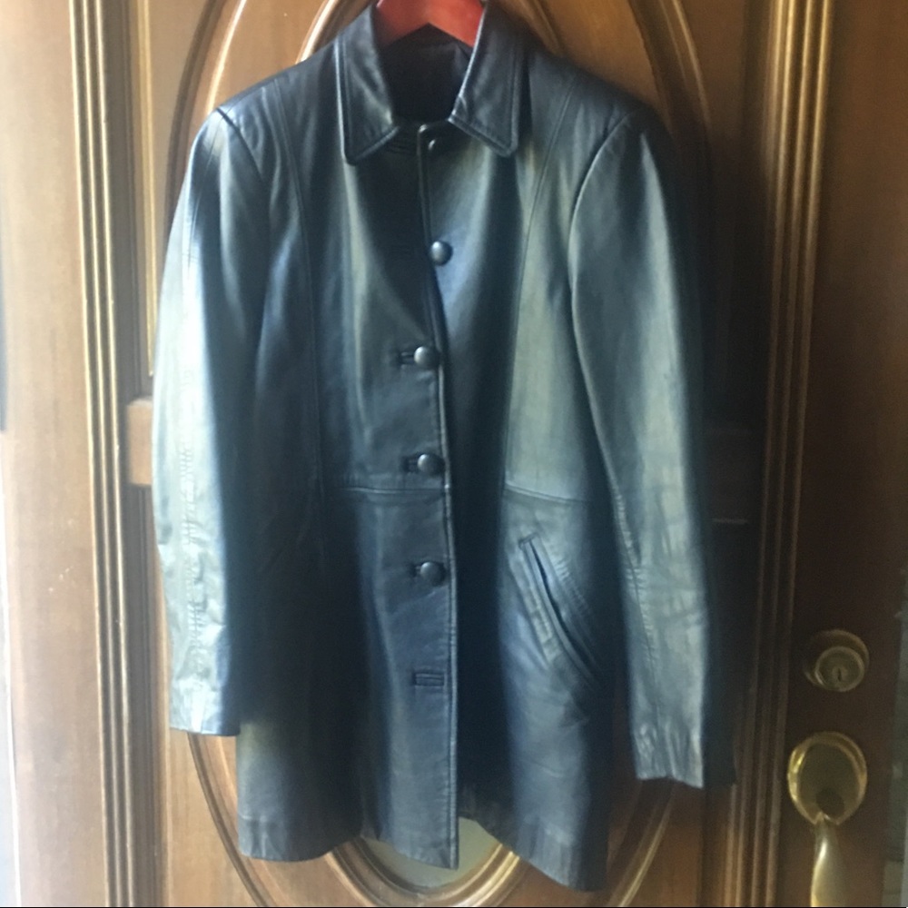Genuine Leather Coat / Jacket  made in Argentina. Quilted inside. Fits Small 4-6